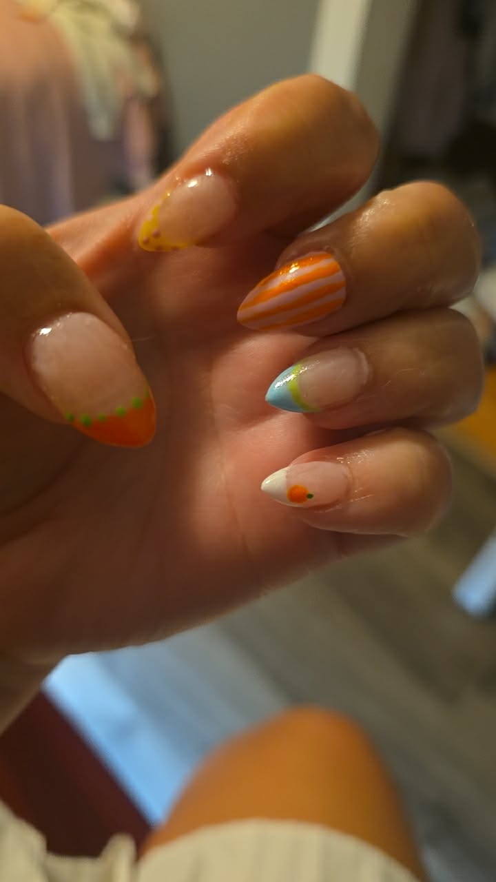 Orange citrus French tip manicure